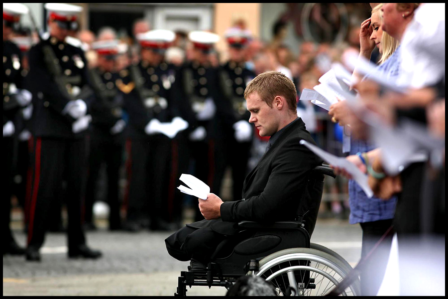 Royal Marine Mark Ormrod joins fellow marines from 40 Commando as they parade the streets of Taunton to mark the completion of their tour of duty in Afghanistan. Published on the Front Page of  The Western Morning News.