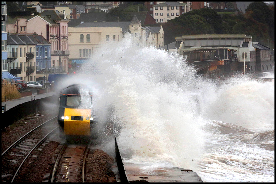 Huge waves crash onto the seafront at Dawlish in Devon as stormy weather moves in across the region.